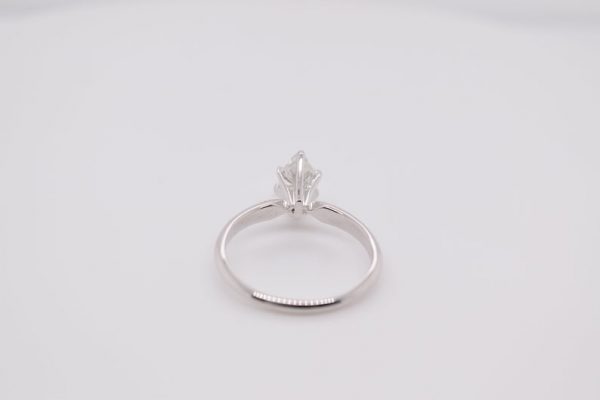 Solitaire Elegant 14K white gold marquise diamond ring with a diamond measuring 7x4.73 mm and weighing 0.68 carat. Ring size 6.25 US.