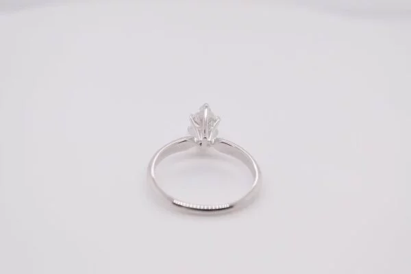 Solitaire Elegant 14K white gold marquise diamond ring with a diamond measuring 7x4.73 mm and weighing 0.68 carat. Ring size 6.25 US.