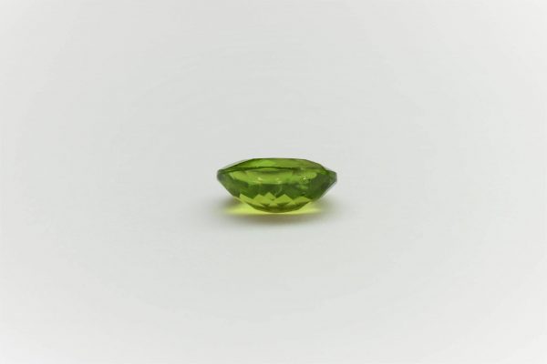 Natural Peridot stone oval gemstone, 18x13.8x7.7 mm, 13.20 carats. August birthstone with positive energy and abundance.