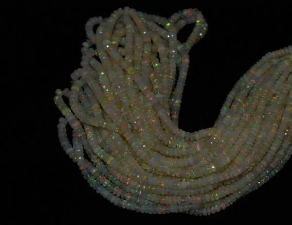 Natural opal Strand of natural Ethiopian opal faceted round beads, 4.2-5 mm, 47-49 carats, 17 inches long. Opal promotes creativity, memory, and self-worth.