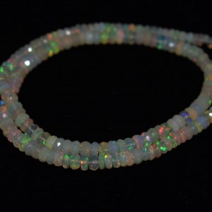 Natural opal Strand of natural Ethiopian opal faceted round beads, 4.2-5 mm, 47-49 carats, 17 inches long. Opal promotes creativity, memory, and self-worth.