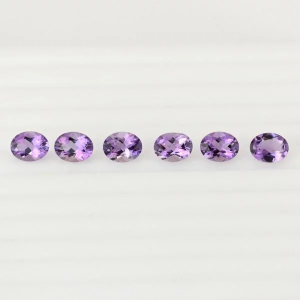 Oval natural amethyst, 1.2 - 1.8 carats, 9 x 7 mm, eye clean quality, February birthstone.