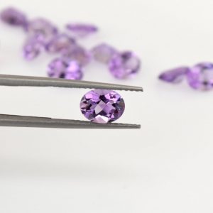 Oval natural amethyst, 1.2 - 1.8 carats, 9 x 7 mm, eye clean quality, February birthstone.