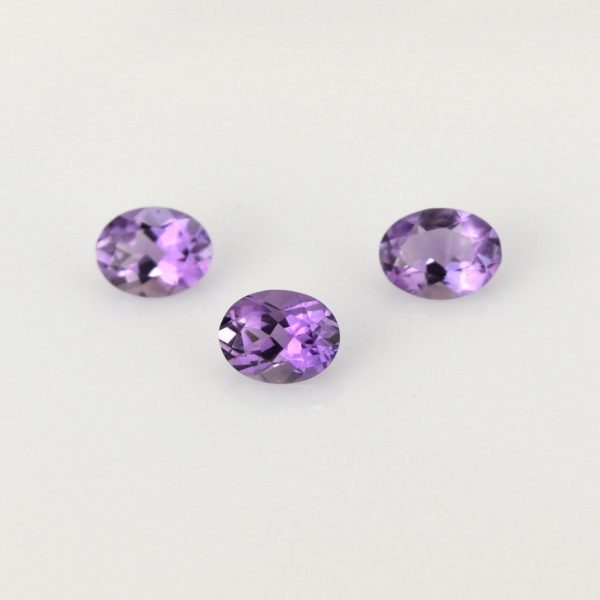 Oval natural amethyst, 1.2 - 1.8 carats, 9 x 7 mm, eye clean quality, February birthstone.