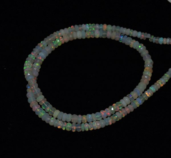 Natural opal Strand of natural Ethiopian opal faceted round beads, 4.2-5 mm, 47-49 carats, 17 inches long. Opal promotes creativity, memory, and self-worth.