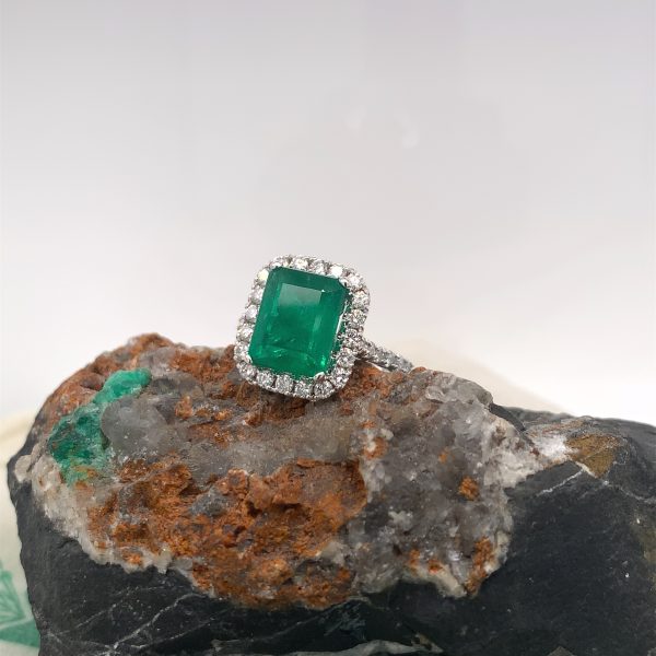 Certified natural Authenticate emerald ring featuring a genuine 2.75 carat emerald and 1.02 carats of diamond accents set in 14K white gold. This authentic and high-quality fine jewelry emerald ring is handcrafted and perfect for collectors or anyone seeking a unique, vintage piece. Its classic elegance and exquisite attention to detail make it a must-have addition to any precious gemstone ring collection.