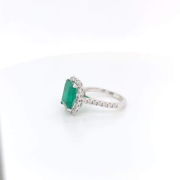 Certified natural Authenticate emerald ring featuring a genuine 2.75 carat emerald and 1.02 carats of diamond accents set in 14K white gold. This authentic and high-quality fine jewelry emerald ring is handcrafted and perfect for collectors or anyone seeking a unique, vintage piece. Its classic elegance and exquisite attention to detail make it a must-have addition to any precious gemstone ring collection.