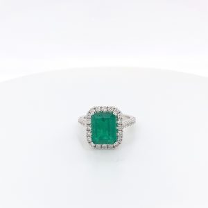 Certified natural Authenticate emerald ring featuring a genuine 2.75 carat emerald and 1.02 carats of diamond accents set in 14K white gold. This authentic and high-quality fine jewelry emerald ring is handcrafted and perfect for collectors or anyone seeking a unique, vintage piece. Its classic elegance and exquisite attention to detail make it a must-have addition to any precious gemstone ring collection.