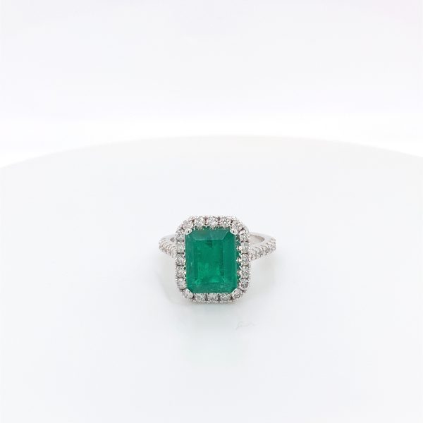 Certified natural Authenticate emerald ring featuring a genuine 2.75 carat emerald and 1.02 carats of diamond accents set in 14K white gold. This authentic and high-quality fine jewelry emerald ring is handcrafted and perfect for collectors or anyone seeking a unique, vintage piece. Its classic elegance and exquisite attention to detail make it a must-have addition to any precious gemstone ring collection.