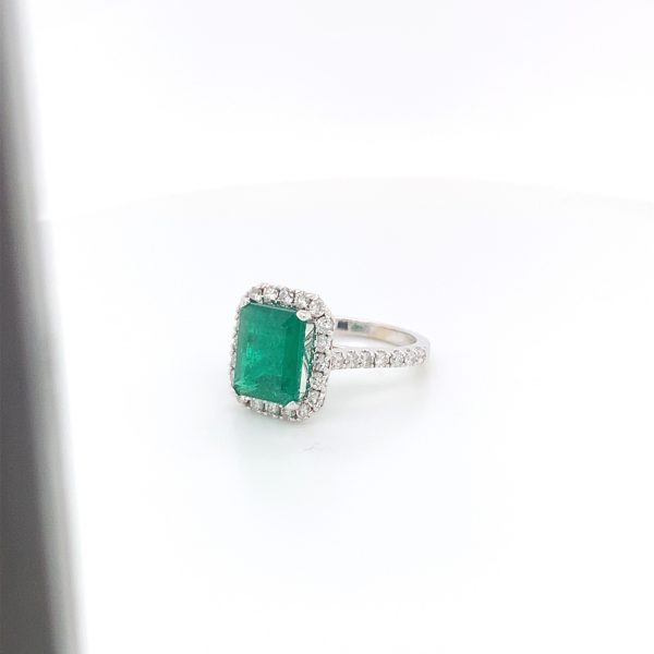 Certified natural Authenticate emerald ring featuring a genuine 2.75 carat emerald and 1.02 carats of diamond accents set in 14K white gold. This authentic and high-quality fine jewelry emerald ring is handcrafted and perfect for collectors or anyone seeking a unique, vintage piece. Its classic elegance and exquisite attention to detail make it a must-have addition to any precious gemstone ring collection.